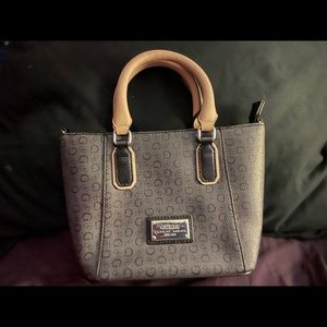Selling my GUESS purse still new barely used still new